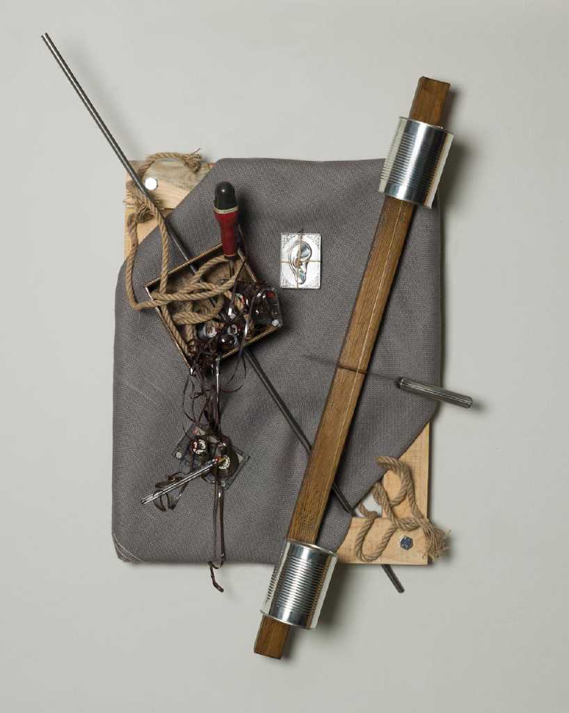 Voice Over, 47 cm x 60 cm x 17 cm, wood, iron, screwdriver, pen, fabric, cleaver, cassettes, old record, juten, rope, aluminium, offering, 2018
