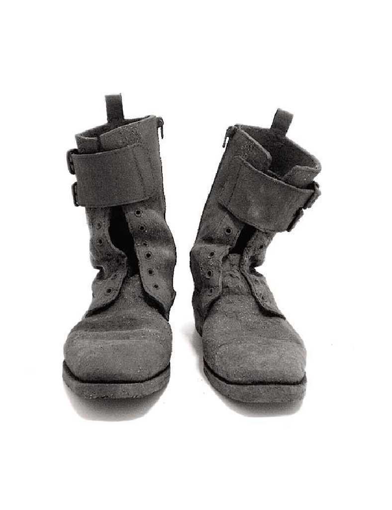 Chryssa Dourgounaki Boots, stoneware, 30 x 27 x 20 cm, 2010 Artist's Statement + Bio
